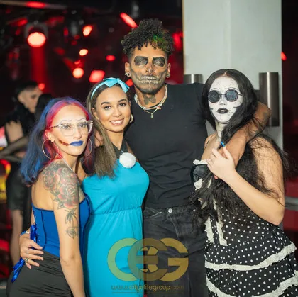Group in creative Halloween costumes at a past Fright Night